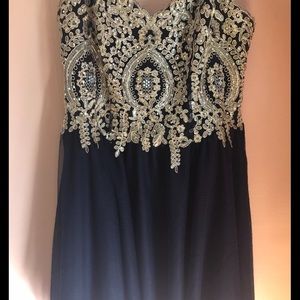 This is a semi dress that was only worn once